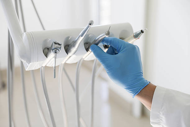Professional Tooth Extraction technician working in Parsons, KS